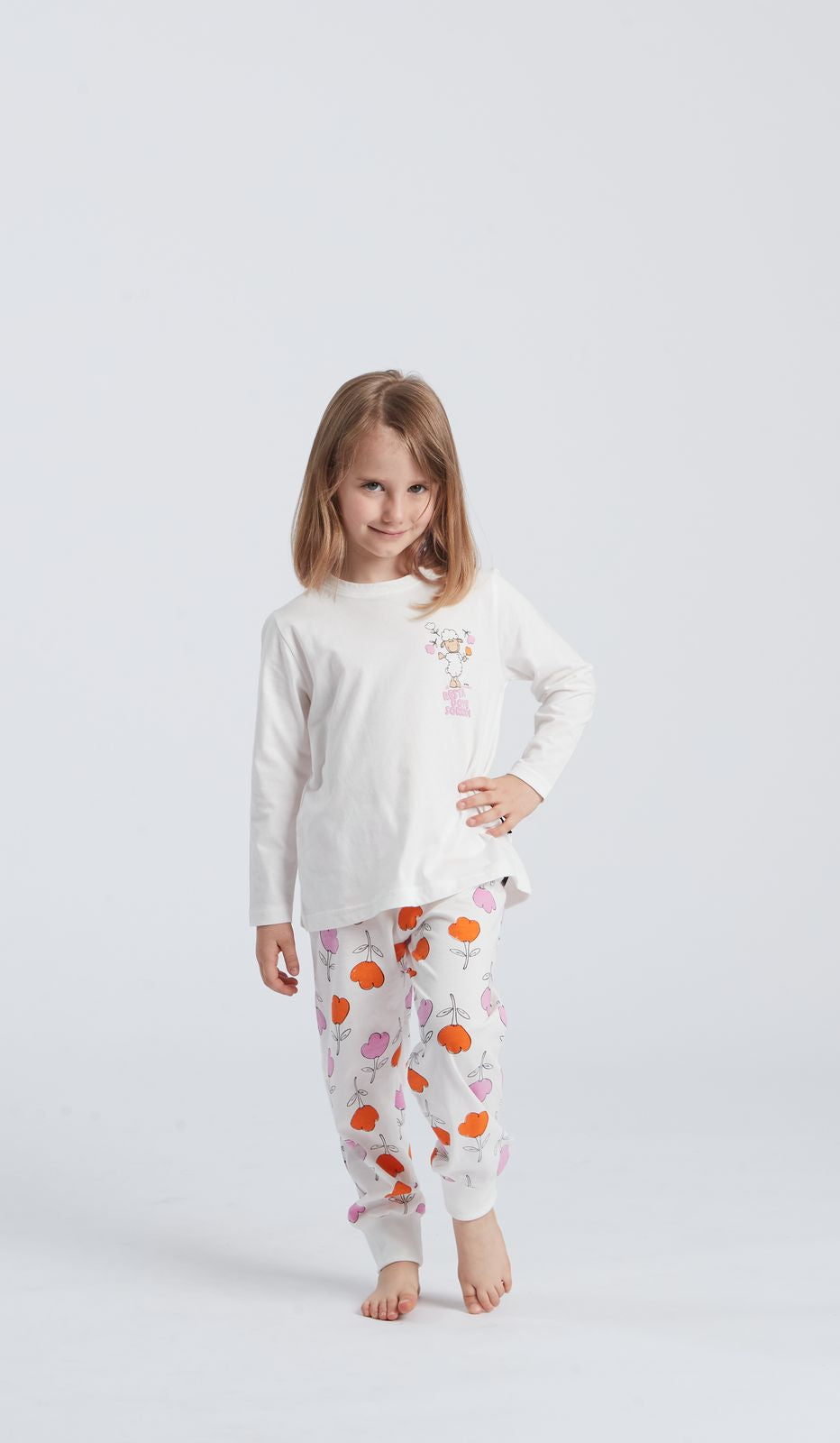 Pigiama girocollo bimba multicolor donna in 100% cotone per un comfort allegro e uno stile giocoso nelle notti di riposo.